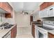 Well-lit kitchen with stainless steel sink and appliances at 5995 N 78Th St # 2030, Scottsdale, AZ 85250