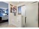 Bathroom boasts a soaking tub and glass-enclosed shower, complemented by a piece of art at 676 N 156Th Ln, Goodyear, AZ 85338