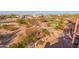 Landscaped backyard with putting green and seating at 8540 E Mcdowell Rd # 55, Mesa, AZ 85207