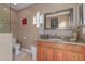 Bathroom with granite countertop vanity and walk-in shower at 8540 E Mcdowell Rd # 55, Mesa, AZ 85207