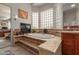 Spa-like bathroom featuring a jetted tub and fireplace at 8540 E Mcdowell Rd # 55, Mesa, AZ 85207