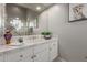 Clean bathroom with vanity, mirror and decorative accents at 8540 E Mcdowell Rd # 55, Mesa, AZ 85207