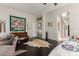 Large bedroom with king-size bed and access to bathroom at 8540 E Mcdowell Rd # 55, Mesa, AZ 85207