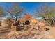 Stone fire pit with seating, perfect for outdoor gatherings at 8540 E Mcdowell Rd # 55, Mesa, AZ 85207