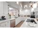 Spacious kitchen with stainless steel appliances and white cabinetry at 8540 E Mcdowell Rd # 55, Mesa, AZ 85207