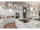 Modern kitchen with a large island and high ceilings at 8540 E Mcdowell Rd # 55, Mesa, AZ 85207