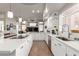 Well-equipped kitchen with white cabinets and stainless steel appliances at 8540 E Mcdowell Rd # 55, Mesa, AZ 85207