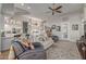 Spacious living area with a view into the kitchen and access to the backyard at 8540 E Mcdowell Rd # 55, Mesa, AZ 85207