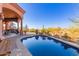 Inviting kidney-shaped pool with a large patio area at 8540 E Mcdowell Rd # 55, Mesa, AZ 85207