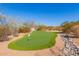 Landscaped putting green for outdoor recreation at 8540 E Mcdowell Rd # 55, Mesa, AZ 85207