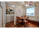 Charming dining area with built-in bench seating and adjacent laundry room for convenience at 10407 N 108Th Ave, Sun City, AZ 85351