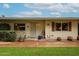 Home exterior shows desert landscaping, well-kept lawn, and inviting entryway at 10407 N 108Th Ave, Sun City, AZ 85351