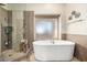 Luxurious bathroom with soaking tub and walk-in shower at 10425 N 23Rd St, Phoenix, AZ 85028