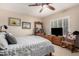 Serene bedroom with rocking chair and wood dresser at 10425 N 23Rd St, Phoenix, AZ 85028