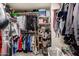 Large walk-in closet with ample shelving and hanging space at 10425 N 23Rd St, Phoenix, AZ 85028