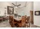 Large dining area with rustic wood table and chairs at 10425 N 23Rd St, Phoenix, AZ 85028