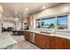 Kitchen with granite countertops, stainless steel appliances, and backyard views at 10425 N 23Rd St, Phoenix, AZ 85028