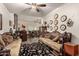 Living area with decorative wall art and view to dining area at 10425 N 23Rd St, Phoenix, AZ 85028