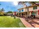 Brick patio with seating area, grill, and putting green at 10425 N 23Rd St, Phoenix, AZ 85028