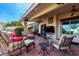 Relaxing covered patio with comfortable seating and a TV at 10425 N 23Rd St, Phoenix, AZ 85028