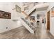 Elegant staircase leading to upper level, viewed from the entryway at 10425 N 23Rd St, Phoenix, AZ 85028