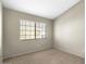 Well-lit bedroom with neutral walls and carpet at 11515 N 91 St # 238, Scottsdale, AZ 85260