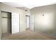 Simple bedroom with double door closet and carpet at 11515 N 91 St # 238, Scottsdale, AZ 85260