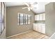 Cozy kitchen nook with white cabinets and tile floor at 11515 N 91 St # 238, Scottsdale, AZ 85260