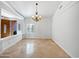 Light and airy dining room features tile floors and a chandelier at 11722 E Starflower Dr, Chandler, AZ 85249