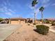 Single-story home with three-car garage and desert landscaping at 11722 E Starflower Dr, Chandler, AZ 85249