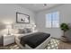 Bedroom with queen bed and stylish decor at 1179 E Coyote Creek Way, San Tan Valley, AZ 85143