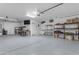 Garage with shelving and plenty of storage space at 1179 E Coyote Creek Way, San Tan Valley, AZ 85143