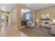 Open living and dining area with neutral tones at 1179 E Coyote Creek Way, San Tan Valley, AZ 85143