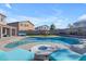 Enjoy this luxurious pool and fire pit in your backyard at 1179 E Coyote Creek Way, San Tan Valley, AZ 85143