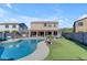 Stunning pool and spa with expansive patio and putting green at 1179 E Coyote Creek Way, San Tan Valley, AZ 85143