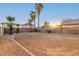 Large backyard with gravel border and desert landscaping at 12833 W Laurel Ln, El Mirage, AZ 85335