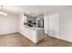 Modern kitchen featuring stainless steel appliances and white cabinets at 12833 W Laurel Ln, El Mirage, AZ 85335