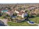 Aerial view of community clubhouse, pool, and golf course at 13403 W Cabrillo Dr, Sun City West, AZ 85375