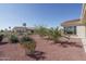 Landscaped backyard with gravel and desert plants at 13403 W Cabrillo Dr, Sun City West, AZ 85375