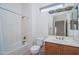 Clean bathroom with tub, toilet and single vanity at 13403 W Cabrillo Dr, Sun City West, AZ 85375