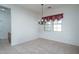 Empty dining room with chandelier and neutral decor at 13403 W Cabrillo Dr, Sun City West, AZ 85375