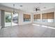 Dining area with tile floors and access to patio at 13403 W Cabrillo Dr, Sun City West, AZ 85375