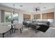 Dining area with table and chairs near sliding doors at 13403 W Cabrillo Dr, Sun City West, AZ 85375