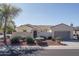 Front view of the house with a garage and landscaping at 13403 W Cabrillo Dr, Sun City West, AZ 85375