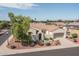 Single story home with a tile roof and attached two car garage at 13403 W Cabrillo Dr, Sun City West, AZ 85375