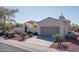 Front view of the house with a garage and landscaping at 13403 W Cabrillo Dr, Sun City West, AZ 85375