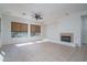 Living room with tile floors and fireplace at 13403 W Cabrillo Dr, Sun City West, AZ 85375