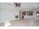 Bright living room with tile floors and fireplace at 13403 W Cabrillo Dr, Sun City West, AZ 85375