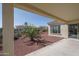 Covered patio with view of backyard and neighboring homes at 13403 W Cabrillo Dr, Sun City West, AZ 85375