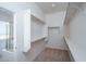 Large walk-in closet with ample shelving and hanging space at 13403 W Cabrillo Dr, Sun City West, AZ 85375